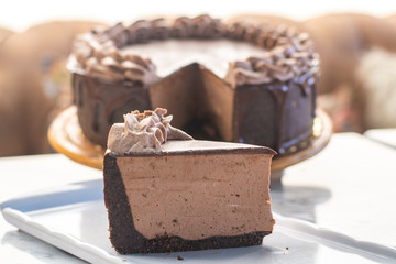 Mocha cheesecake with chocolate and coffee whipped cream on top