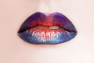 Delightful lip makeup, multi-colored transitions. Beautiful women's lips with bright lipstick, bright stylish makeup