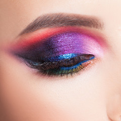 Amazing Bright eye makeup in luxurious blue shades. Pink and blue color, colored eyeshadow - obrazy, fototapety, plakaty