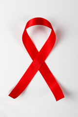 Red bow ribbon on white background