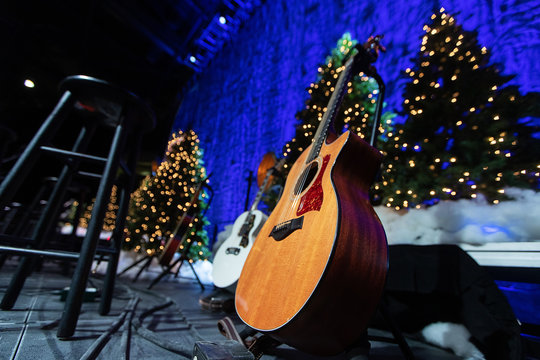 Acoustic Guitar On Stage During Christmas Holiday Concert