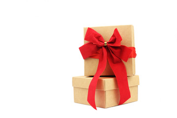 cardboard boxes with a red bow