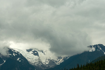 Fototapeta na wymiar Storm clouds above the glacier on Oscar Peak in British Columbia, Canada