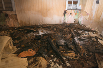 Fototapeta premium Old abandoned and dirty wall of the interior