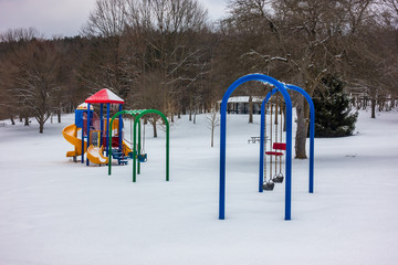 children playground in winter