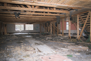 Fototapeta na wymiar Devastated room in an abandoned building background