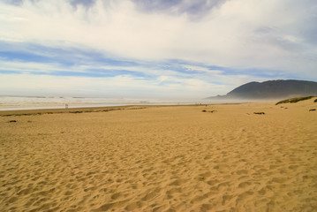 Man and Woman on Secluded Oregon Beach