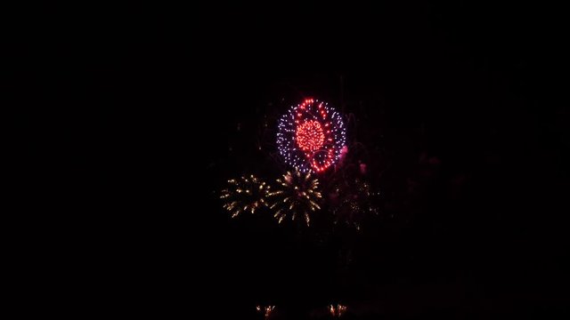 Slow motion fireworks show stars and balls with center balls
