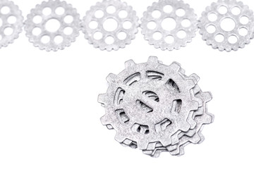 Old vintage antique hour metal gears, cogwheels isolated on white background