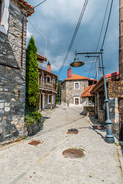 traditional alley at Agios Athanasios village in Macedonia Greece near the snow center of Kaimaktsalan