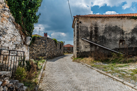 traditional alley at Agios Athanasios village in Macedonia Greece near the snow center of Kaimaktsalan