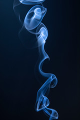 Abstract blue smoke swirls