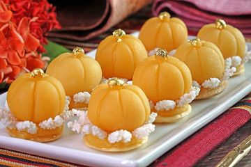 Thai dessert (Royal Thai cuisine) : Golden crown cake (Kha nom Dara Thong or Ja Mong Kut) , Most famous of nine auspicious desserts in Thai tradition, made from yolk, wheat flour and edible gold