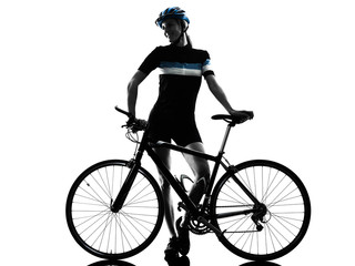Fototapeta premium one caucasian cyclist woman cycling riding bicycle in silhouette isolated on white background
