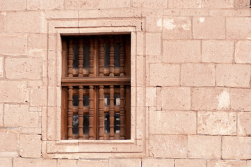 old window in brick wall 