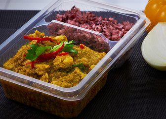 Curry chicken with sauce and rice food pan