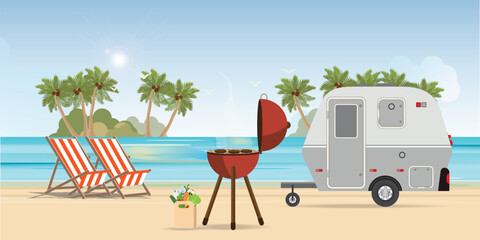 Retro caravan on the beach and picnic with outdoor barbecue.