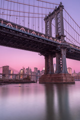 View on Manhattan Bridge and financial district from east river ,with long exposure