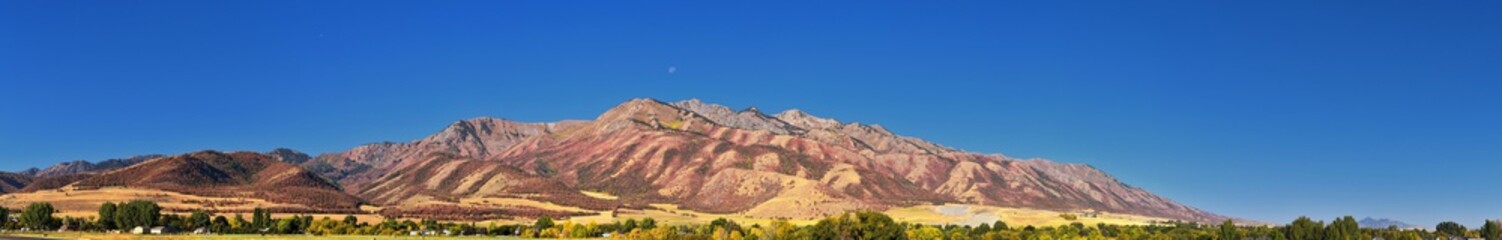 Logan Valley landscape views including Wellsville Mountains, Nibley, Hyrum, Providence and College Ward towns, home of Utah State University, in Cache County a branch of the Wasatch Range of the Rocky © Jeremy