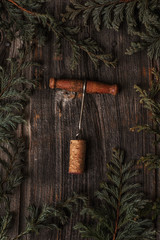 corkscrew surrounded by pine