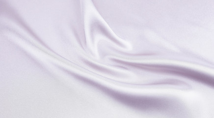 The texture of the satin fabric of lilaccolor for the background 