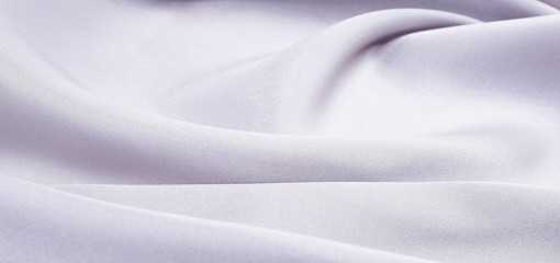 The texture of the satin fabric of lilaccolor for the background 