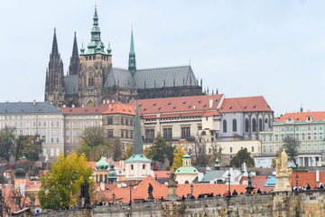 prague river bank and old town at background, czech republic