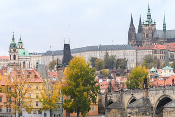 prague river bank and old town at background, czech republic
