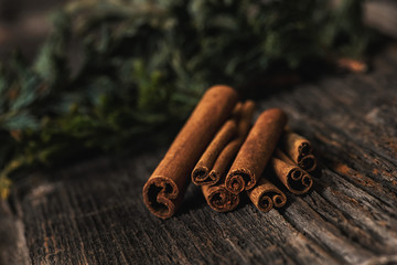 cinnamon sticks on wooden background