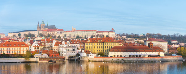 Fototapeta premium prague river bank and old town at background, czech republic