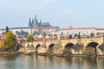 Fototapeta na wymiar prague river bank and old town at background, czech republic