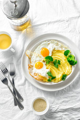Top view healthy breakfast lunch mashed potatoes fried eggs broccoli tea