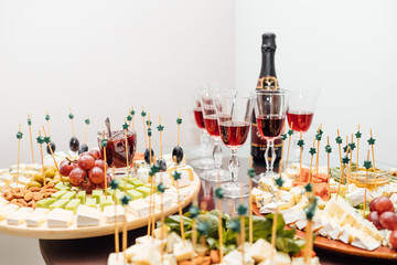 Tasting cheese dish . Delicious cheese on the table. Table setti