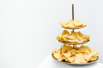 Chips texture crisp potato background of golden unhealthy food .