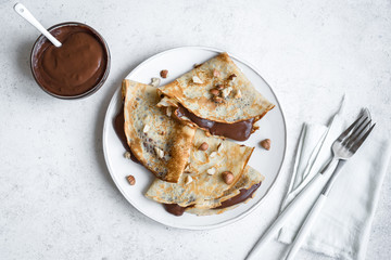 Crepes with chocolate and nuts