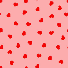 Vector seamless pattern for Valentine's Day. Cute hand drawn hearts on pink background