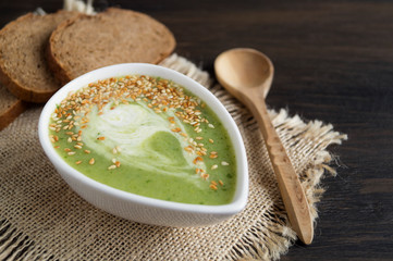 Vegetarian spinach soup in a white plate.