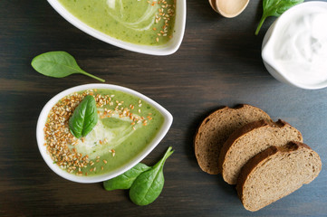 Vegetarian spinach soup in a white plate.