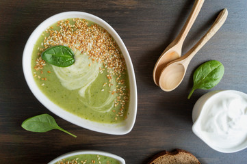 Vegetarian spinach soup in a white plate.