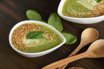 Vegetarian spinach soup in a white plate.