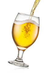 Beer pouring process. Filling a mug with a beer. File contains clipping path.