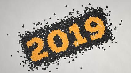 2019 number made from black and orange confetti