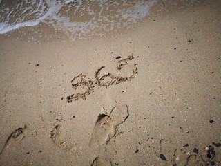 365 days written on the beach