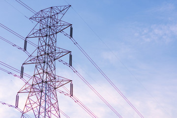 Electricity concept. Close up high voltage power lines station.