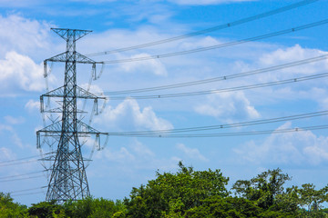 Electricity concept. Close up high voltage power lines station.