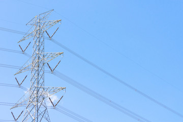 Electricity concept. Close up high voltage power lines station.