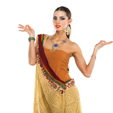Caucasian brunette woman in brown indian national dress sari
