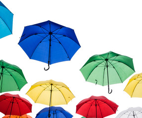 Colorful umbrellas on white background