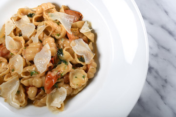 Gnocchi with fresh cherry tomatoes sauce, basil and Parmesan cheese