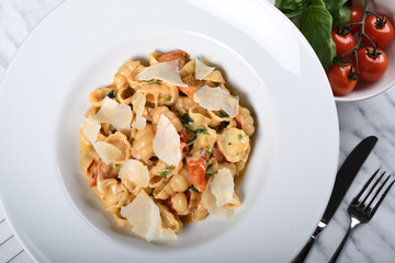 Gnocchi with fresh cherry tomatoes sauce, basil and Parmesan cheese